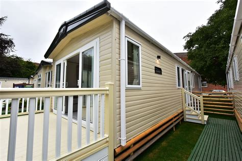 The classically designed lounge area is spacious and also features a cosy sofa bed to sleep a further 2 people. . Abi static caravan reviews